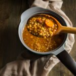 Lentil soup with sun-dried tomatoes and pine nuts | epochwellbeing.com